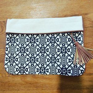 Smart Black and ivory geo print canvas clutch 13" x 9" with  tassel accent